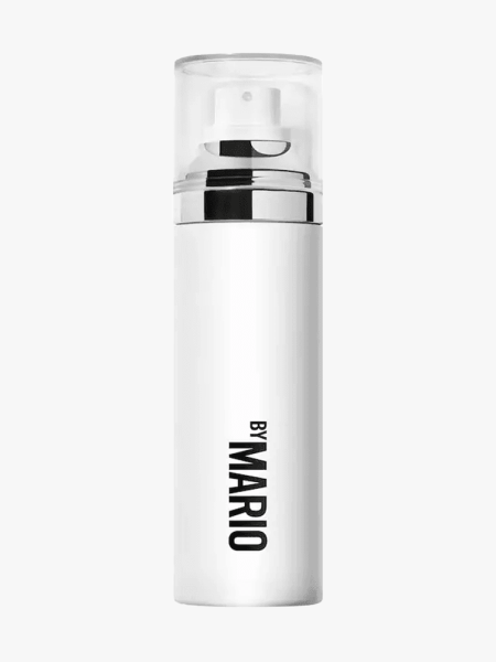 Makeup by Mario SurrealSkin Soft Setting Spray in branded component on a light gray background